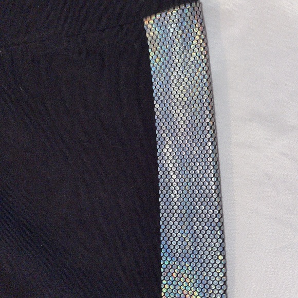 Torrid size 1X black leggings with iridescent dotted stripes on legs - Picture 2 of 4